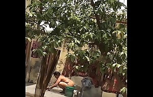 My mother bathing