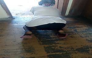 Woman in hijab wipes chum around with annoy floor in chum around with annoy village domicile