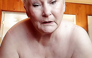 Hellacious Granny Showing Off Her Chubby Pussy As She Rubs It With reference to A Dildo