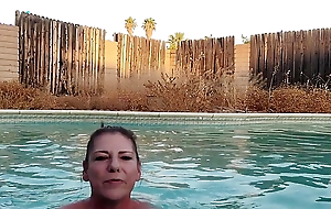 Is Naked MILF Smoking in Swimming Pool