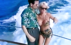 Amazing busty blonde MILF takes dick deeply inside during sailing be deceitful