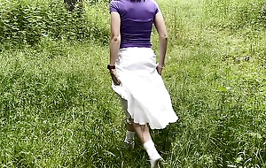 Outdoors 'I bet you'd like to fuck me'. Blinking with a dress.